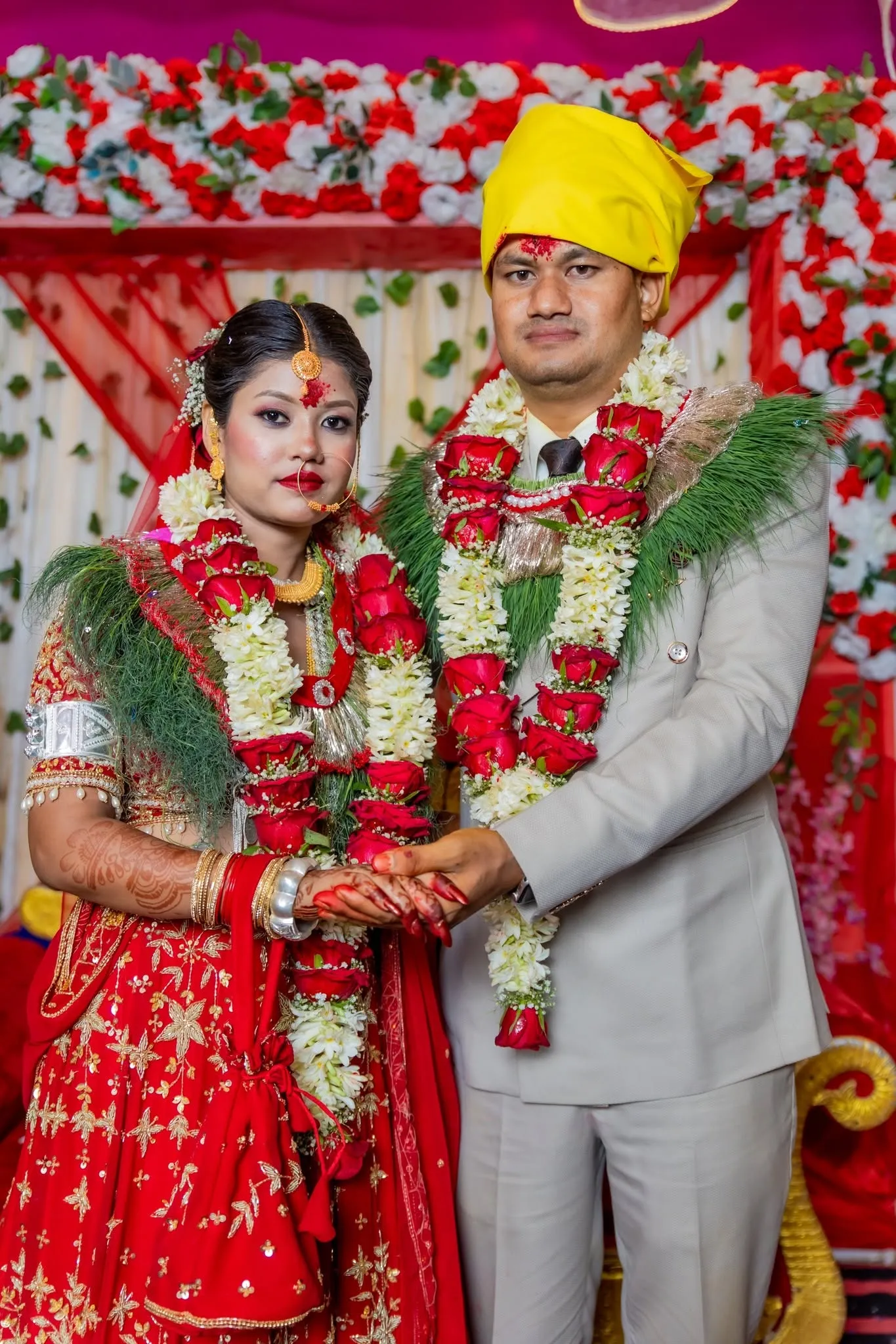 Bridge and groom holding hands