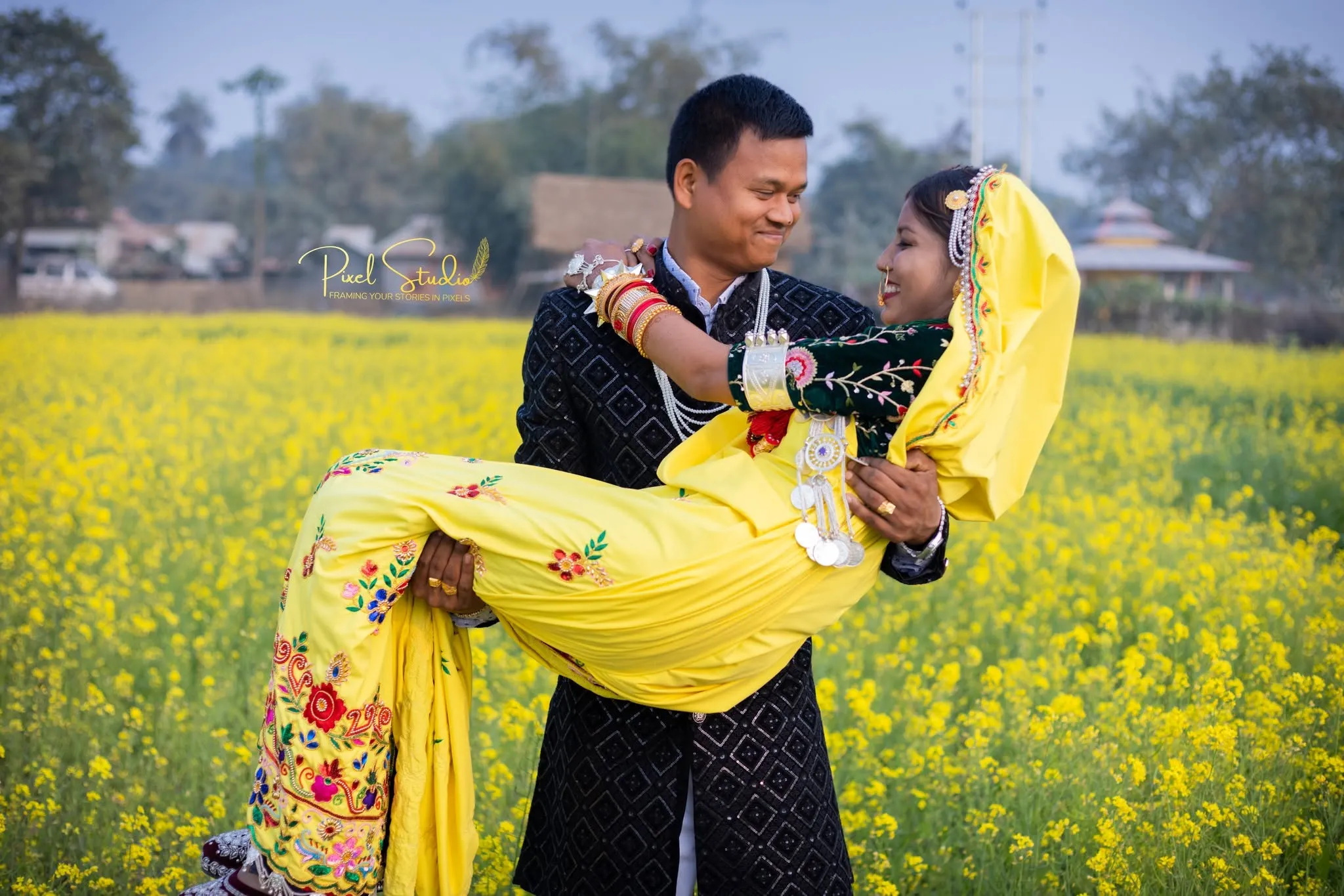 Groom carrying bridge